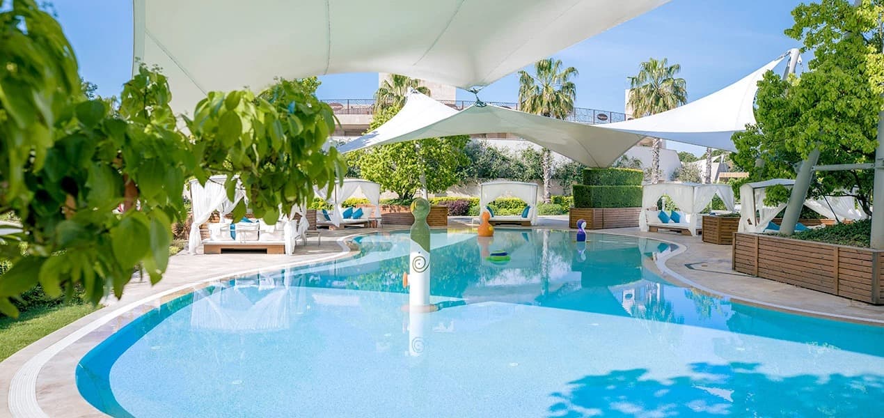 Shaded Kids’ Pool Area & Play Area